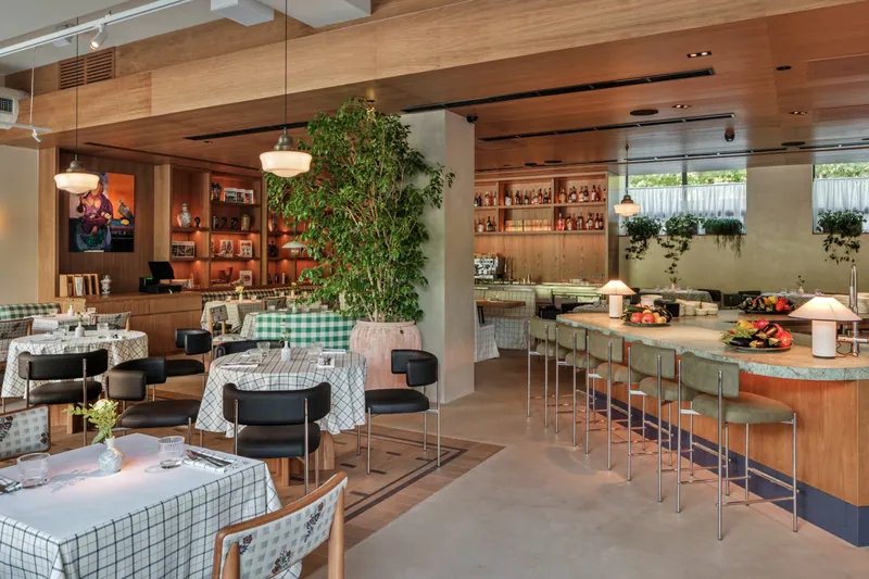 Bar area with half-armchairs and tables