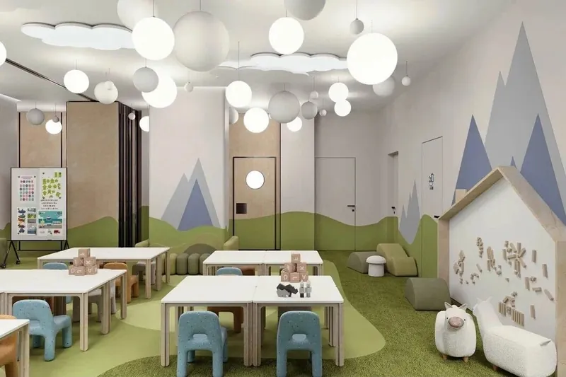 Classroom with small chairs and soft seating in pastel colours