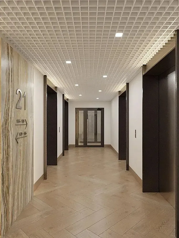 Corridor of a residential floor with lift portal surrounds