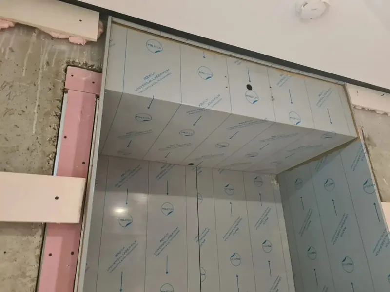 Portal surround delivered in protective film during the fit-out